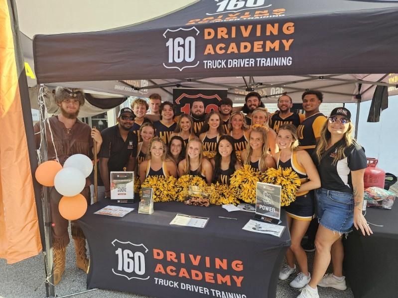 160 Driving Academy Charleston Branch Participated in Mountaineer Main Street Block Party!